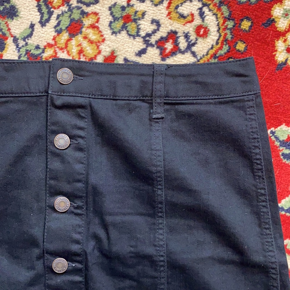Black denim skirt